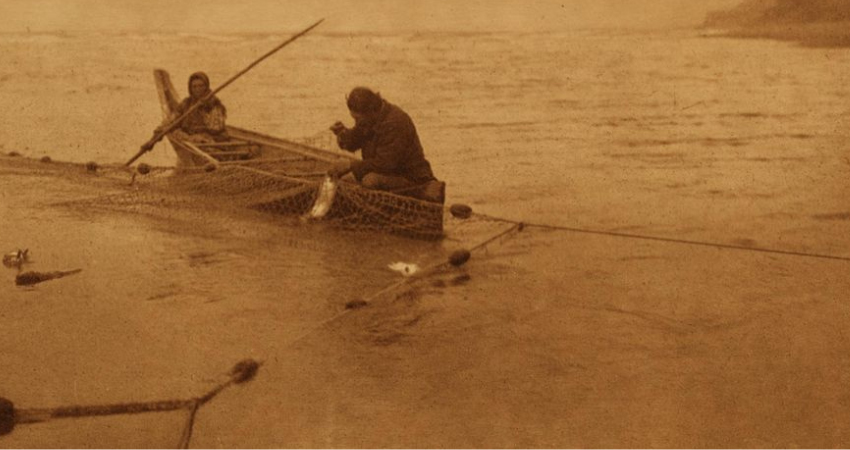 Two Quinault tribal members fishing in 1910